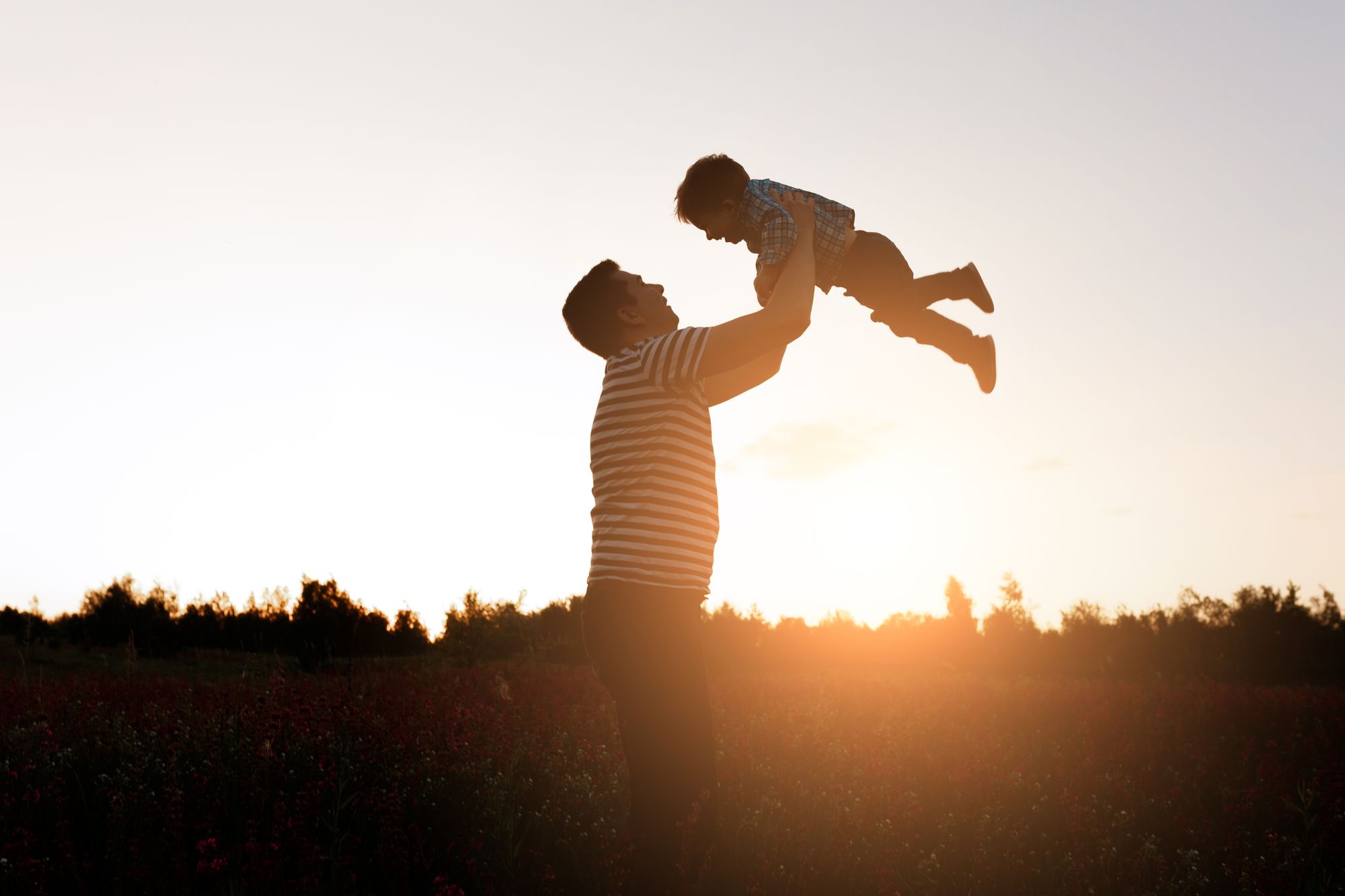 father-son-playing-park-sunset-time-happy-family-having-fun-outdoor-2